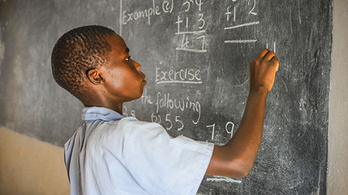 Jonah at chalkboard